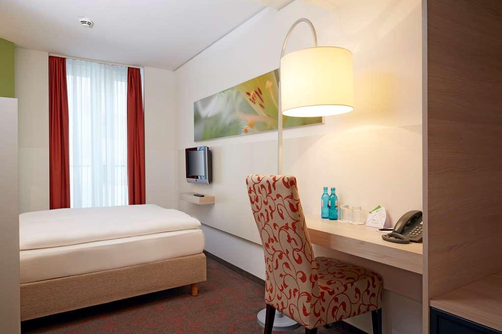 H+ Hotel Munchen Rom bilde